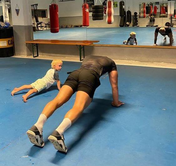 Conor Jack McGregor Jr. doing a push up with his father, Conor McGregor.